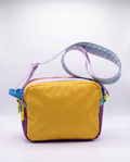 The Analog Bag in Purple and Yellow with the woven pastel strap